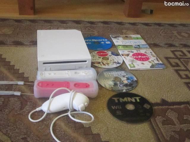 Consola Wii cu 2 telecomenzi si 4 jocuri