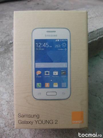 Samsung galaxy young 2 noi sigilate in cutie pe alb si grii.