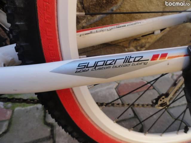 Bicicleta MTB- Felt- Deore XT, frane disc hidraulice