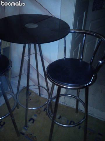 Masa inalta din sticla si scaun inalt cu spatar pentru bar