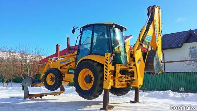 Komatsu WB93R an fabricatie 2006 merita vazut