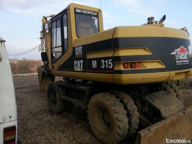 excavator pe roti CAT M315