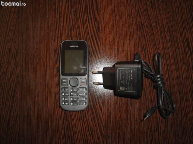 Nokia 100 + incarcator + casti