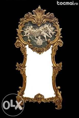 Oglinda cu rama baroc si ornamente din alabastru